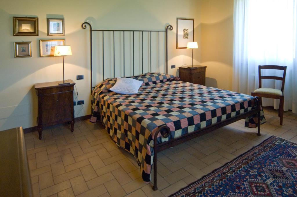 Postel nebo postele na pokoji v ubytování Residenza Isabella