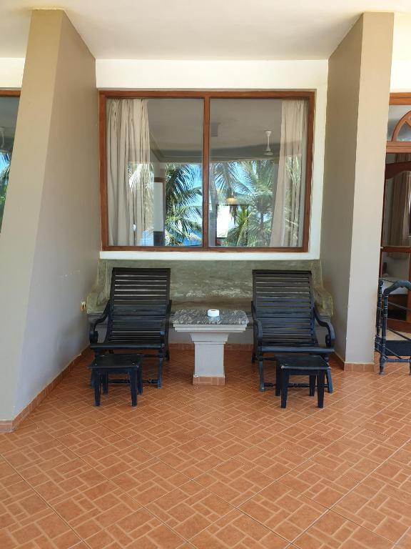 Posezení v ubytování Oasey Ayurveda Hotel