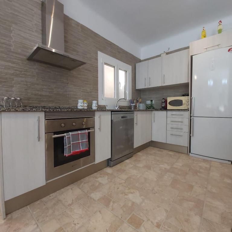 Kuchyň nebo kuchyňský kout v ubytování Hauzify I Apartaments Maritime