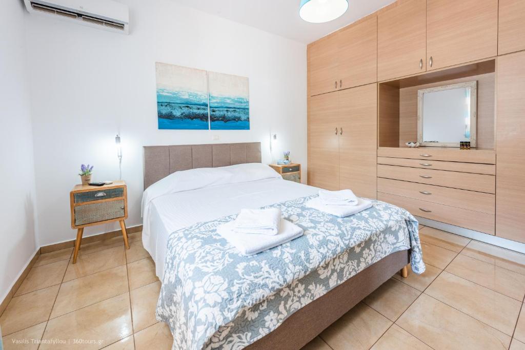 A bed or beds in a room at Orama