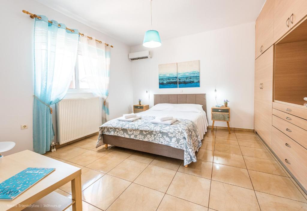 A bed or beds in a room at Orama
