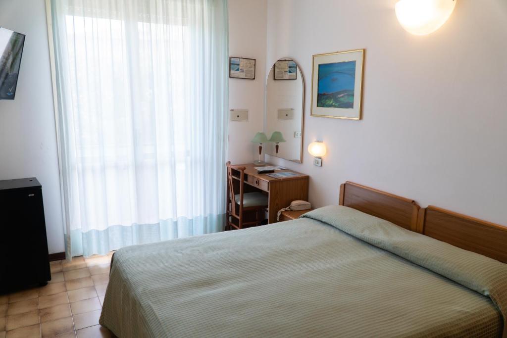 TV a/nebo společenská místnost v ubytování Hotel Cinzia