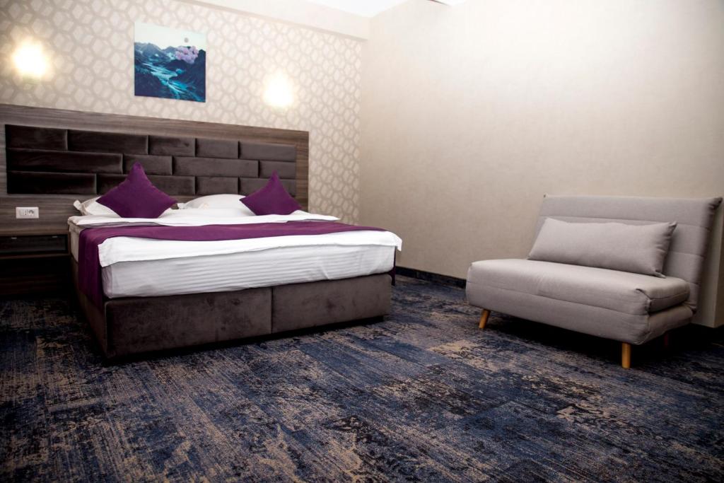 Postel nebo postele na pokoji v ubytování Hotel Yarus Plus