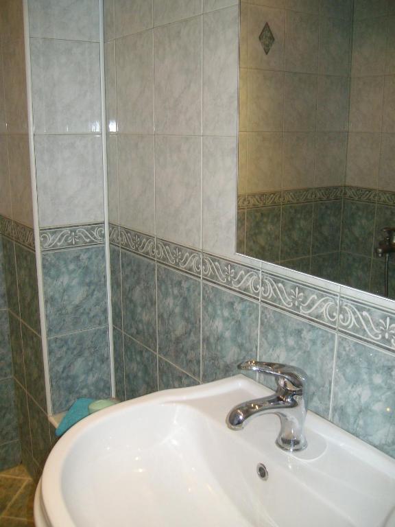 A bathroom at Bulhotel Pritzker Apartment