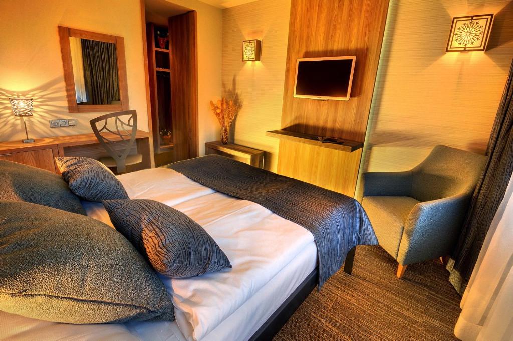 Postel nebo postele na pokoji v ubytování Hotel Grand Jasná