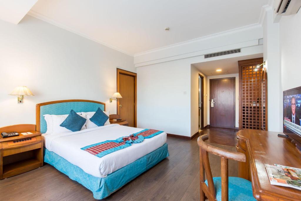 Postel nebo postele na pokoji v ubytování Hotel Le Himalaya