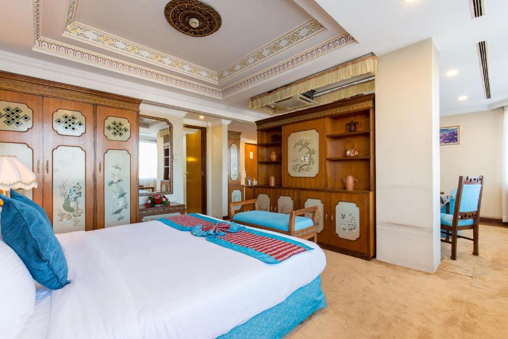 Postel nebo postele na pokoji v ubytování Hotel Le Himalaya