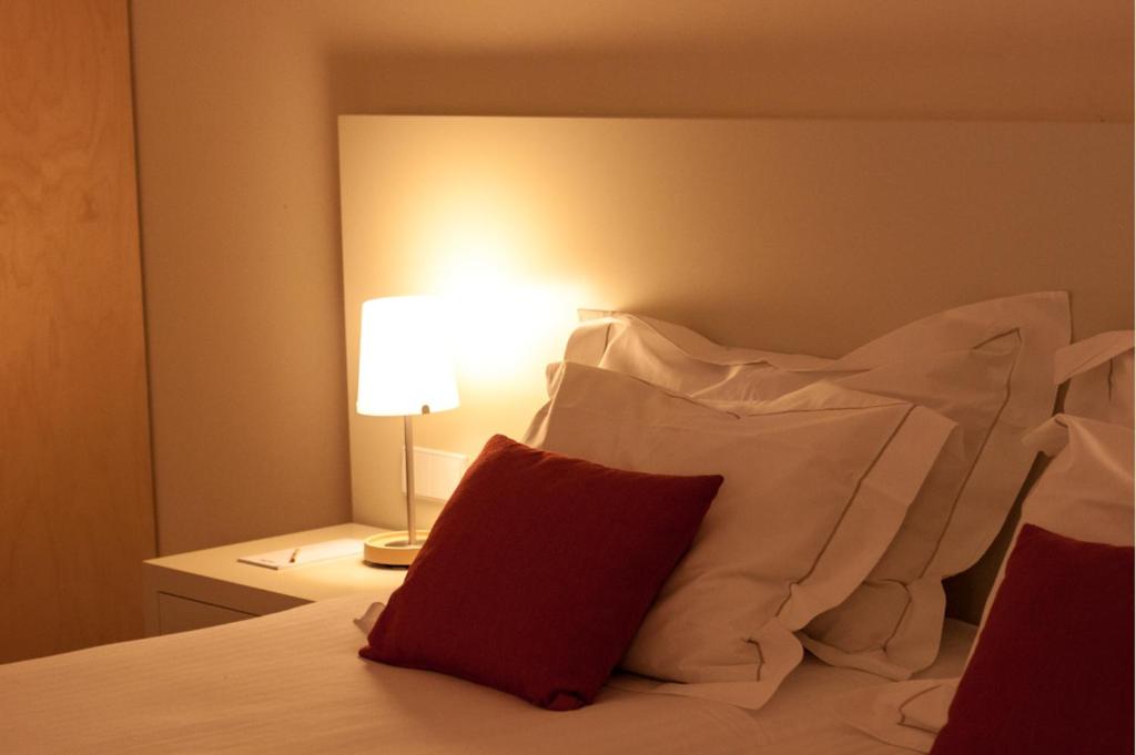 Postel nebo postele na pokoji v ubytování INLIMA Hotel & Spa