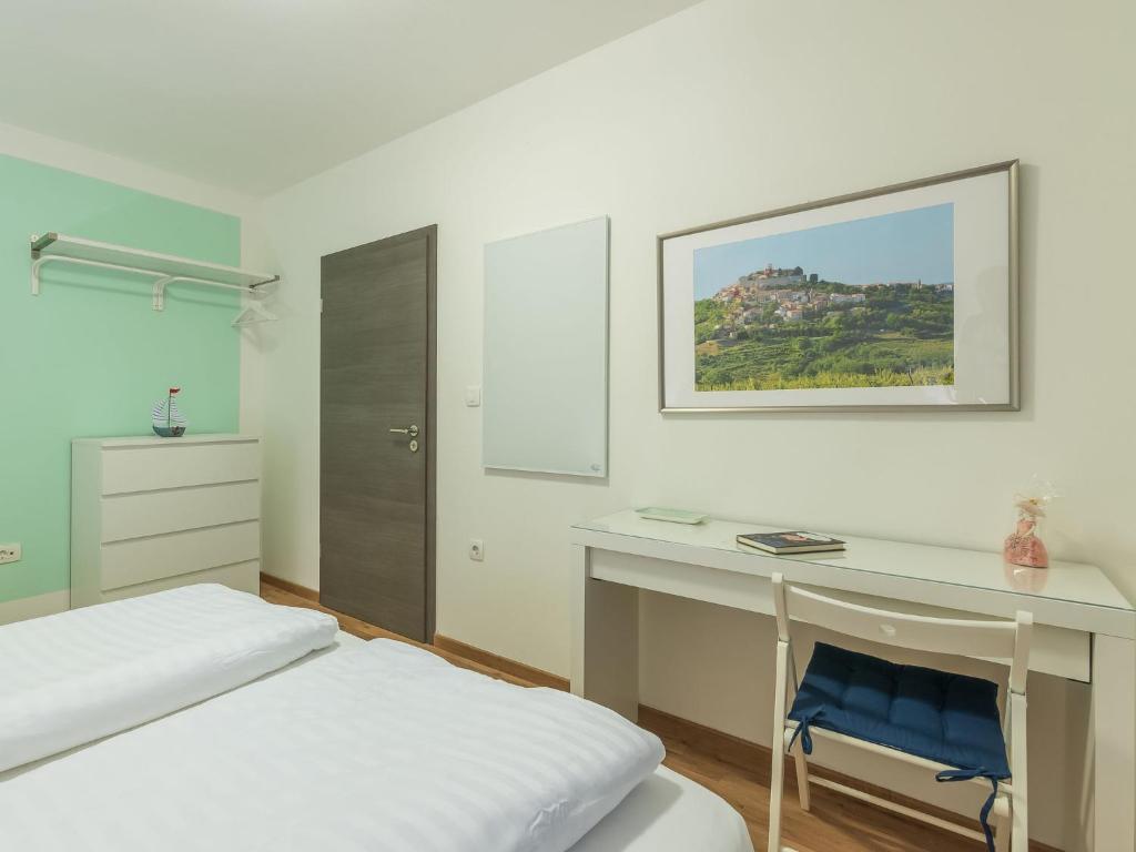 Łóżko lub łóżka w pokoju w obiekcie Holiday Home Villa Joy by Interhome