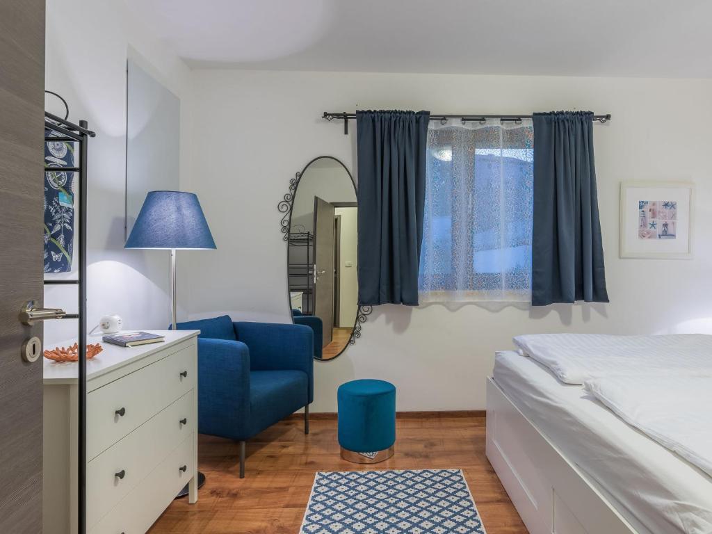 Łóżko lub łóżka w pokoju w obiekcie Holiday Home Villa Joy by Interhome