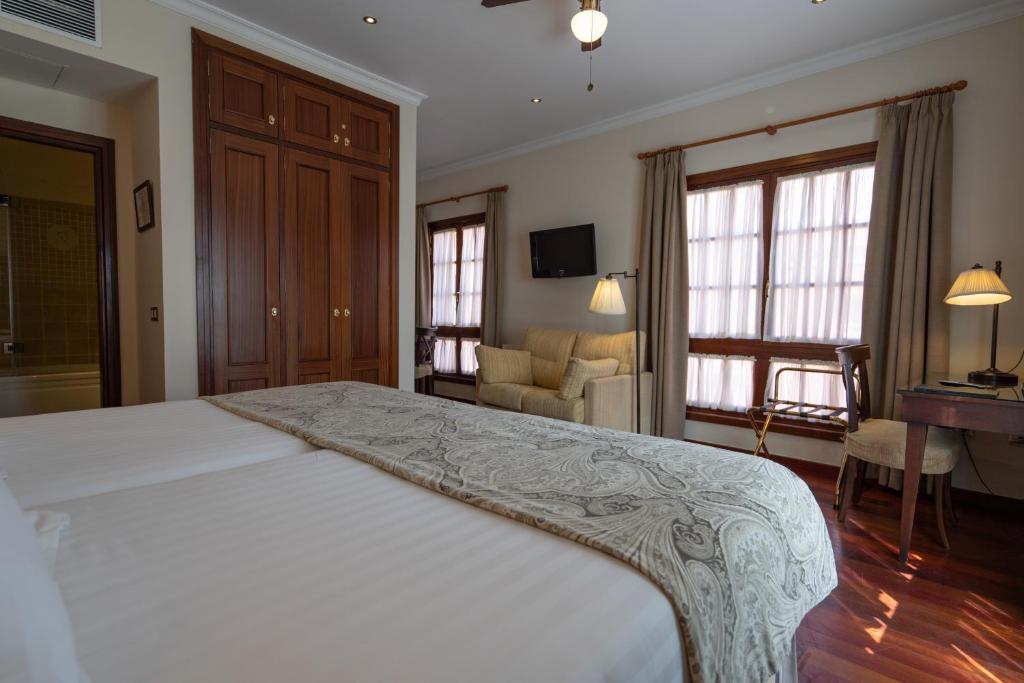 Posteľ alebo postele v izbe v ubytovaní Laguna Nivaria Hotel & Spa