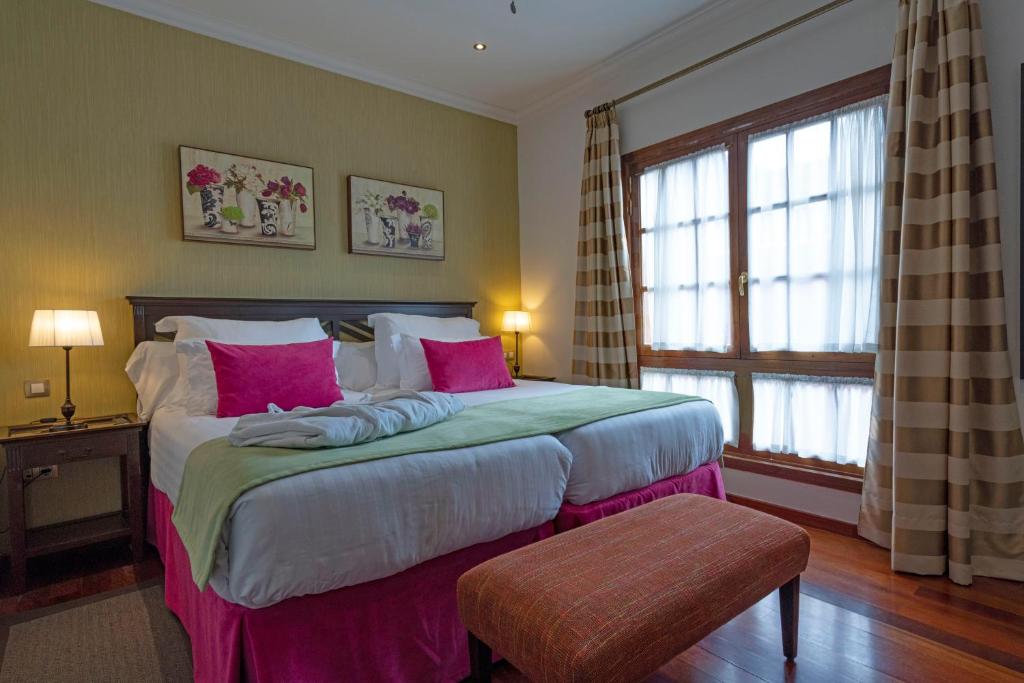 Posteľ alebo postele v izbe v ubytovaní Laguna Nivaria Hotel & Spa