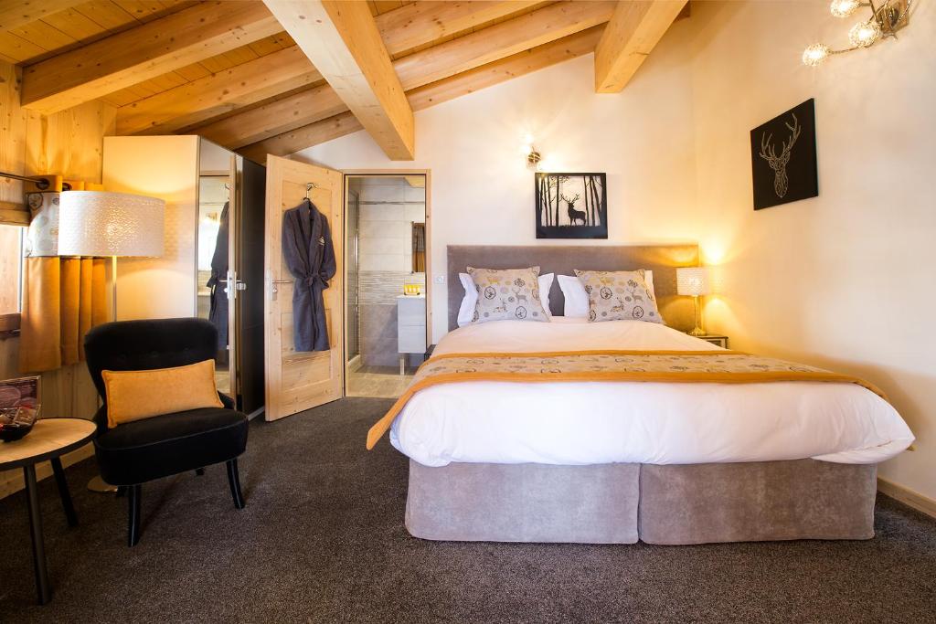 Postel nebo postele na pokoji v ubytování Chalet l’Aiglon