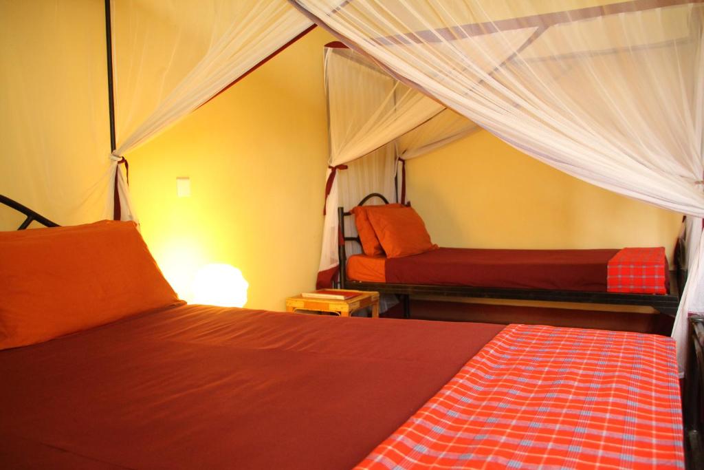 Postel nebo postele na pokoji v ubytování Red Chilli Hideaway