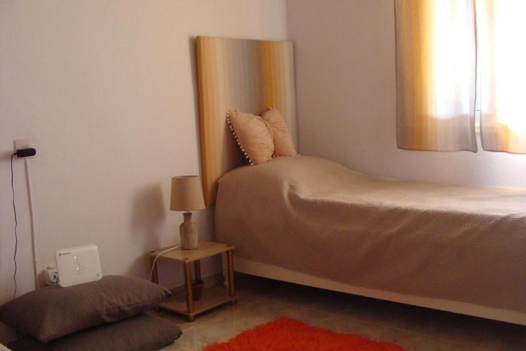 A bed or beds in a room at Gorjelina `s House