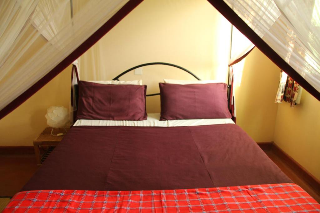 Postel nebo postele na pokoji v ubytování Red Chilli Hideaway