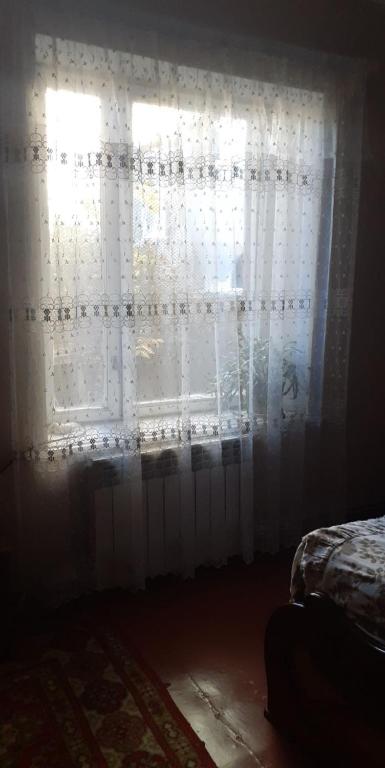 Postel nebo postele na pokoji v ubytování Guest House OTILIA