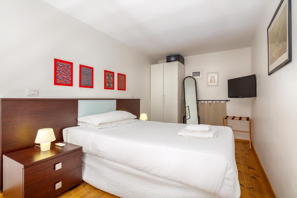 Posteľ alebo postele v izbe v ubytovaní HT Residence Maximus