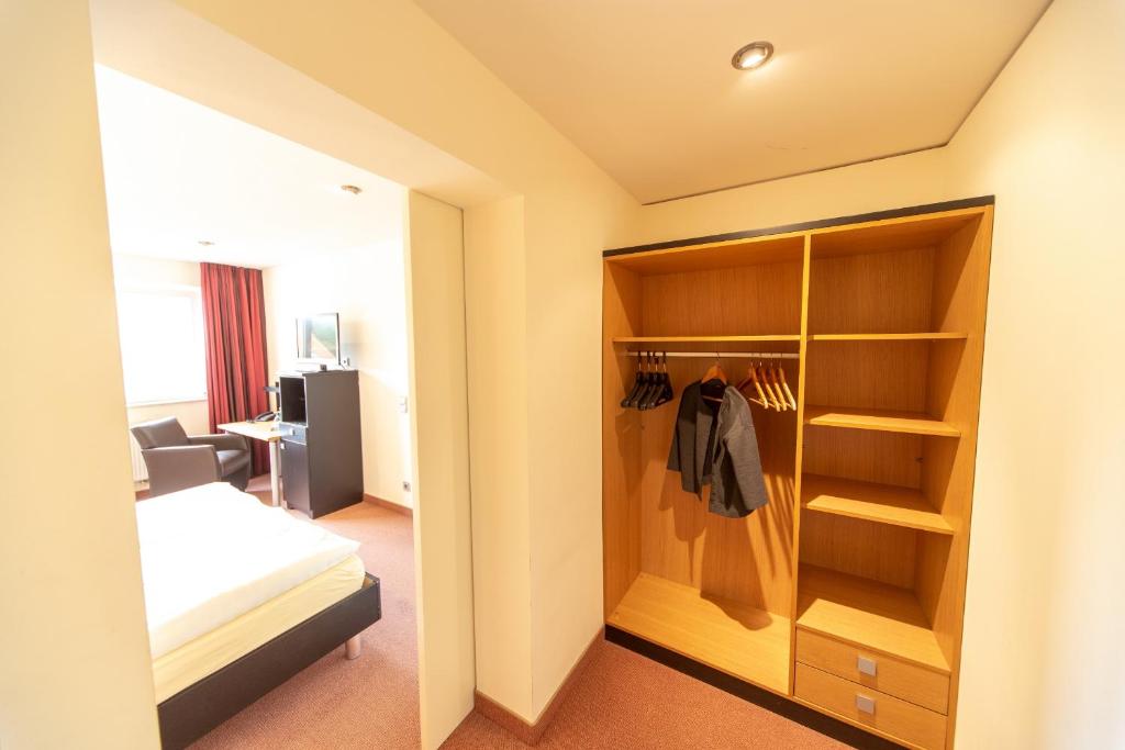 Postel nebo postele na pokoji v ubytování Hotel Rügenblick