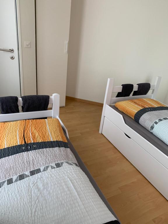 Postel nebo postele na pokoji v ubytování Haus zur Eiche Private 3,5 Zimmerwohnung bis zu 8 Gäste