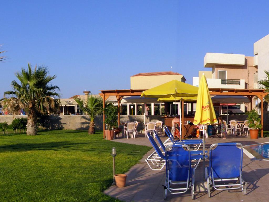 Restauracja lub miejsce do jedzenia w obiekcie Ilian Beach & Apartments