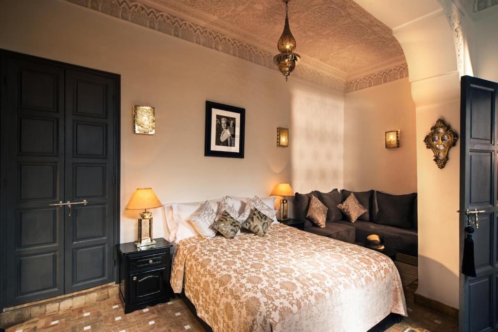 Postel nebo postele na pokoji v ubytování Riad Star by Marrakech Riad