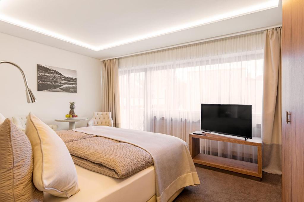 TV a/nebo společenská místnost v ubytování Hotel Arte