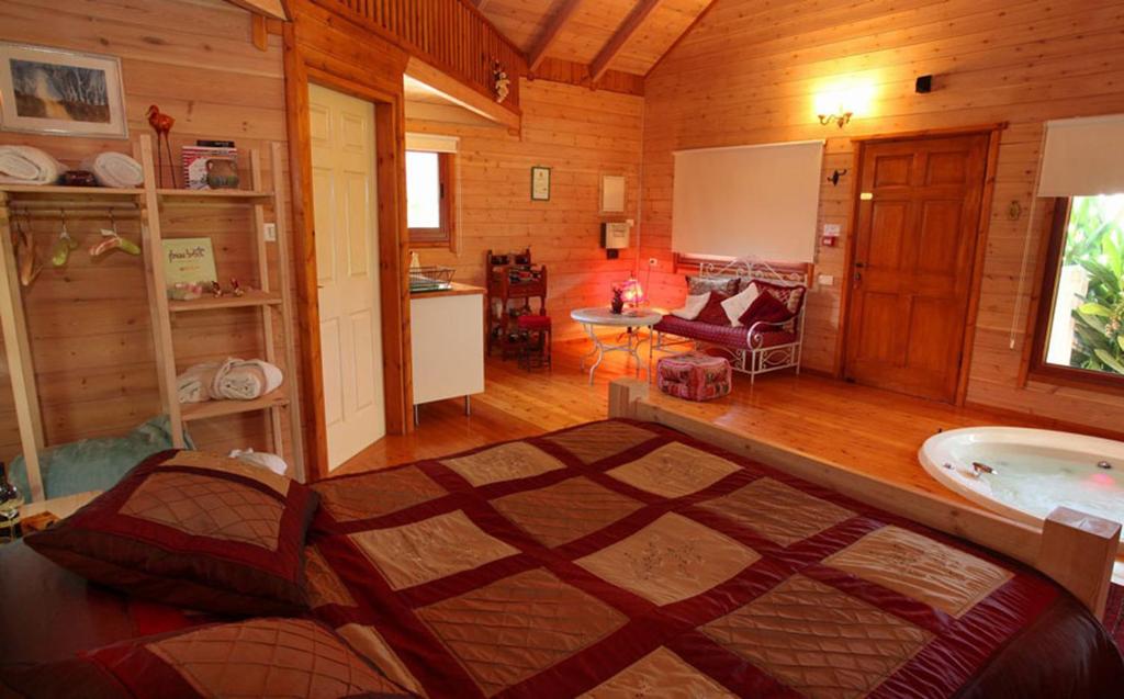 Postel nebo postele na pokoji v ubytování The Beautiful Cabins