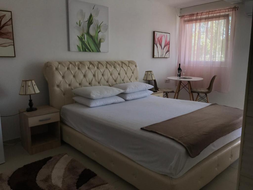Postel nebo postele na pokoji v ubytování Apartmani Breze