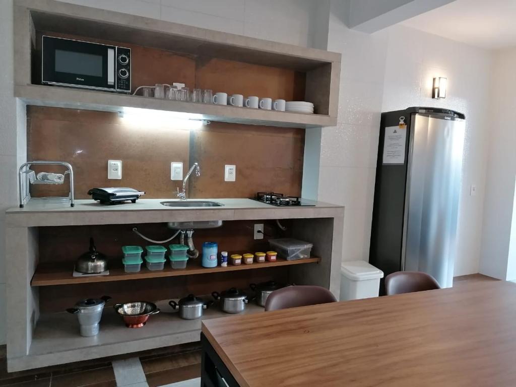 Kuchyň nebo kuchyňský kout v ubytování Bahia Pelô Hostel