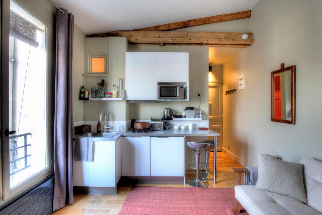 Imagen de la galería de Atelier, dernier étage bail mobilité Centre paris, en París
