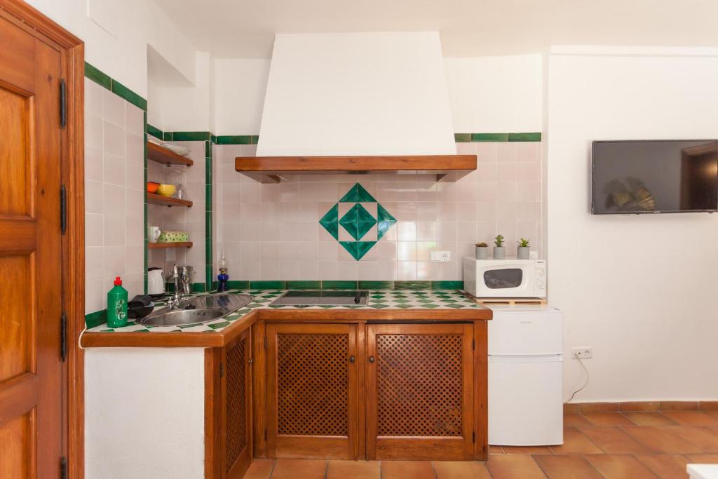 A kitchen or kitchenette at Casa Larga