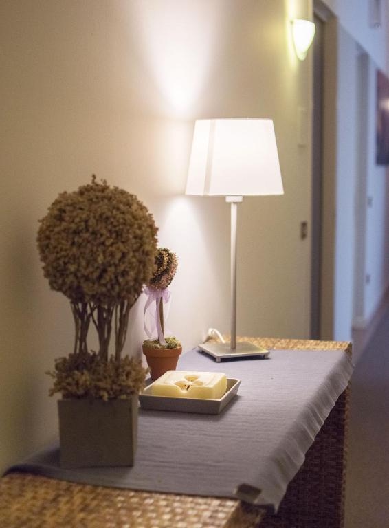 Postel nebo postele na pokoji v ubytování Hotel Positano