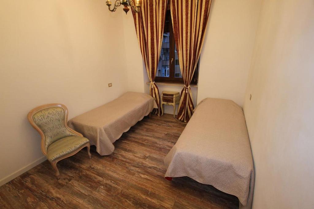 Postel nebo postele na pokoji v ubytování Ciao Verona Bed and Kitchen