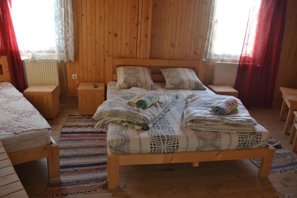 Postel nebo postele na pokoji v ubytování Hotel Zlagoda