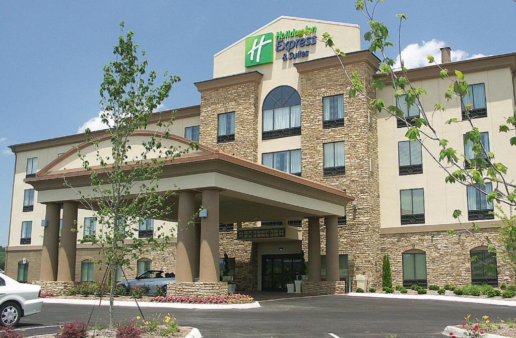 a hotel with a sign on the front of it at Holiday Inn Express & Suites - Cleveland Northwest, an IHG Hotel in Cleveland