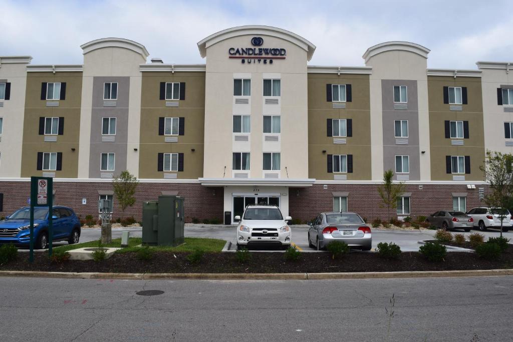 a large building with cars parked in a parking lot at Candlewood Suites - Nashville Metro Center, an IHG Hotel in Nashville