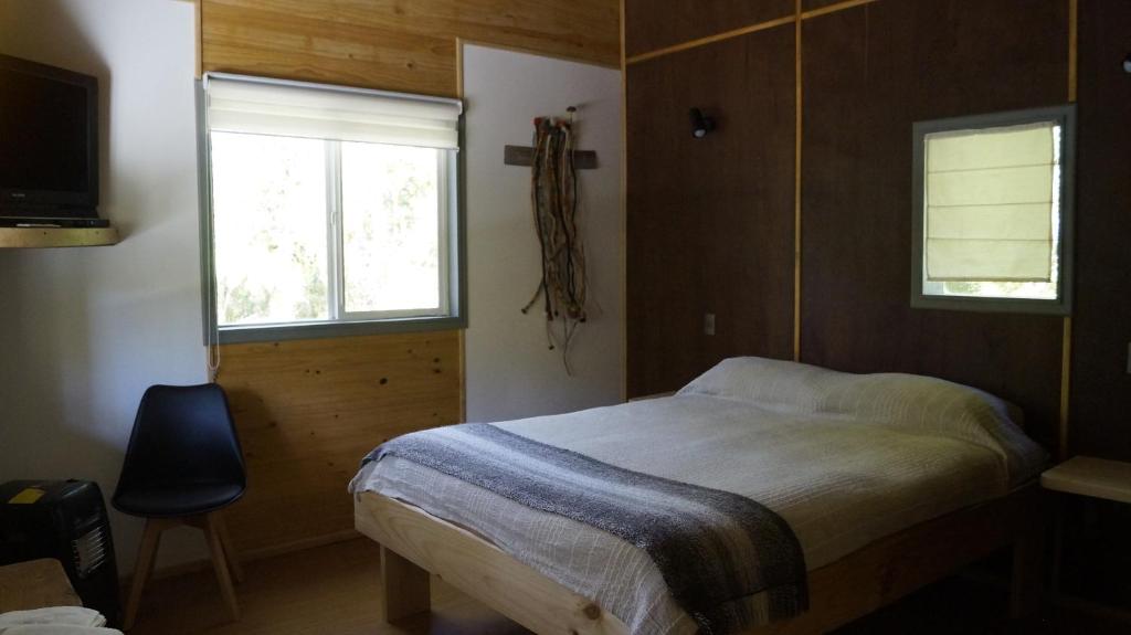 Postel nebo postele na pokoji v ubytování Posada de Expediciones Kahuel