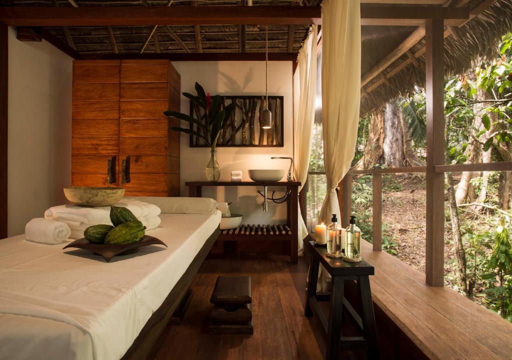Postel nebo postele na pokoji v ubytování Inkaterra Hacienda Concepcion