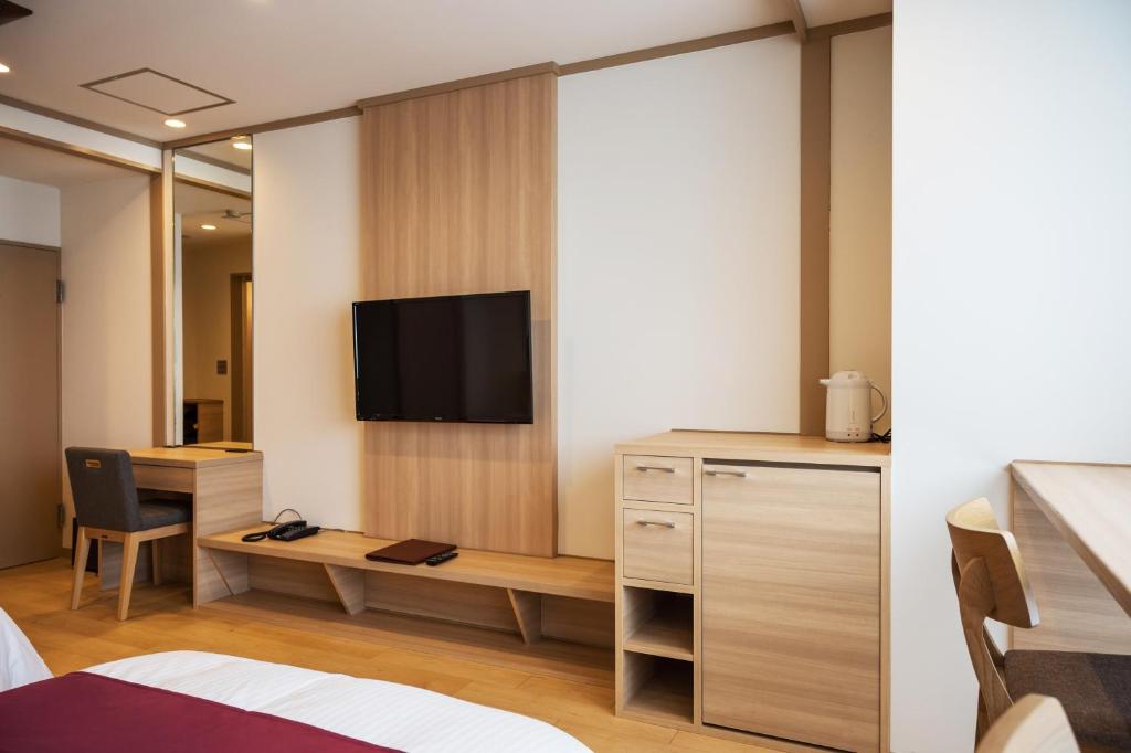 TV a/nebo společenská místnost v ubytování Oarai Hotel Annex Gyoraian