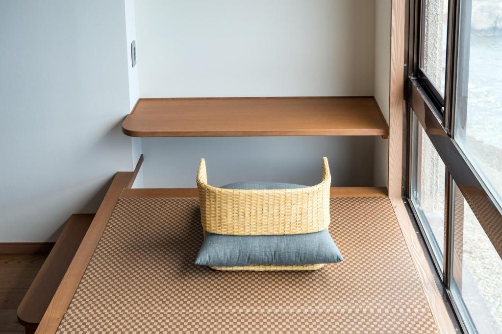 Postel nebo postele na pokoji v ubytování Oarai Hotel Annex Gyoraian