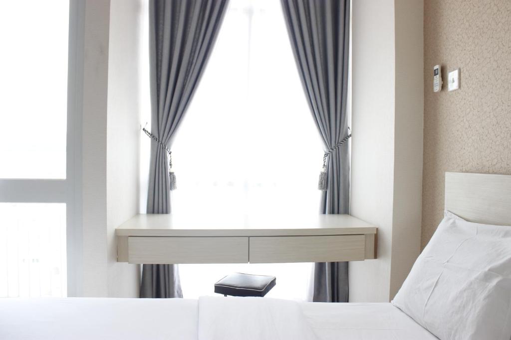 Suitetrails - Minimalist Studio Room Taman Melati Apartment Jatinangor By Travelio