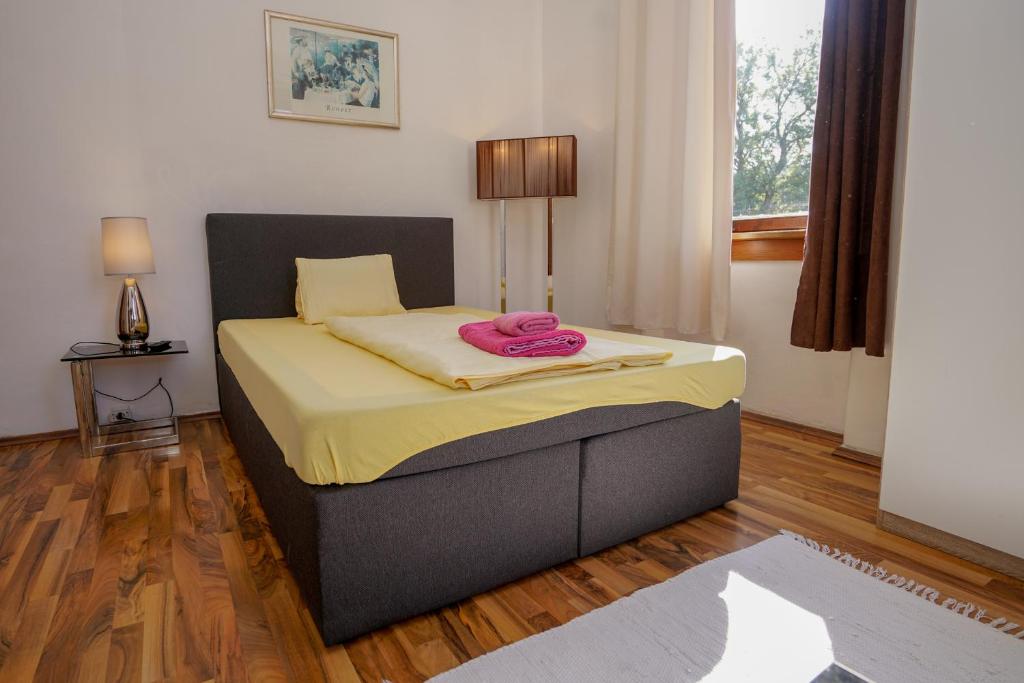Postel nebo postele na pokoji v ubytování Hotel Rosmann