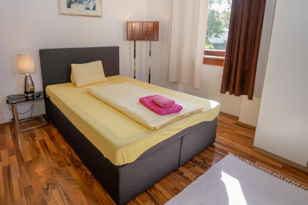 Postel nebo postele na pokoji v ubytování Hotel Rosmann