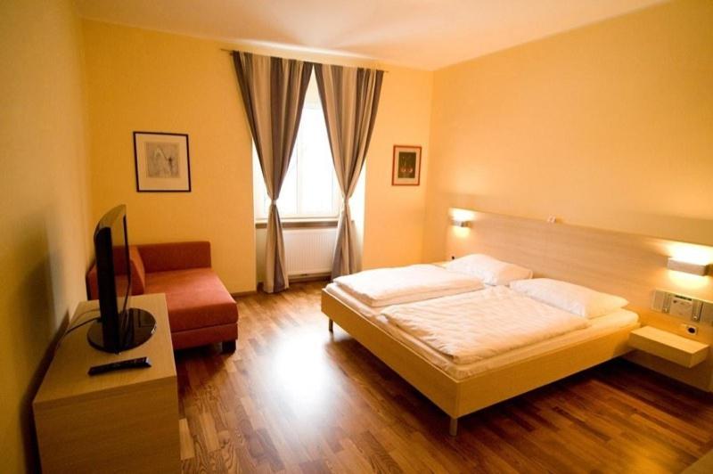 Postel nebo postele na pokoji v ubytování Gasthof Ludl