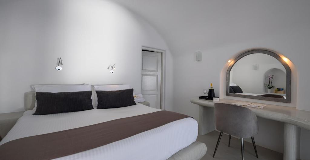 Postel nebo postele na pokoji v ubytování Pegasus Suites & Spa