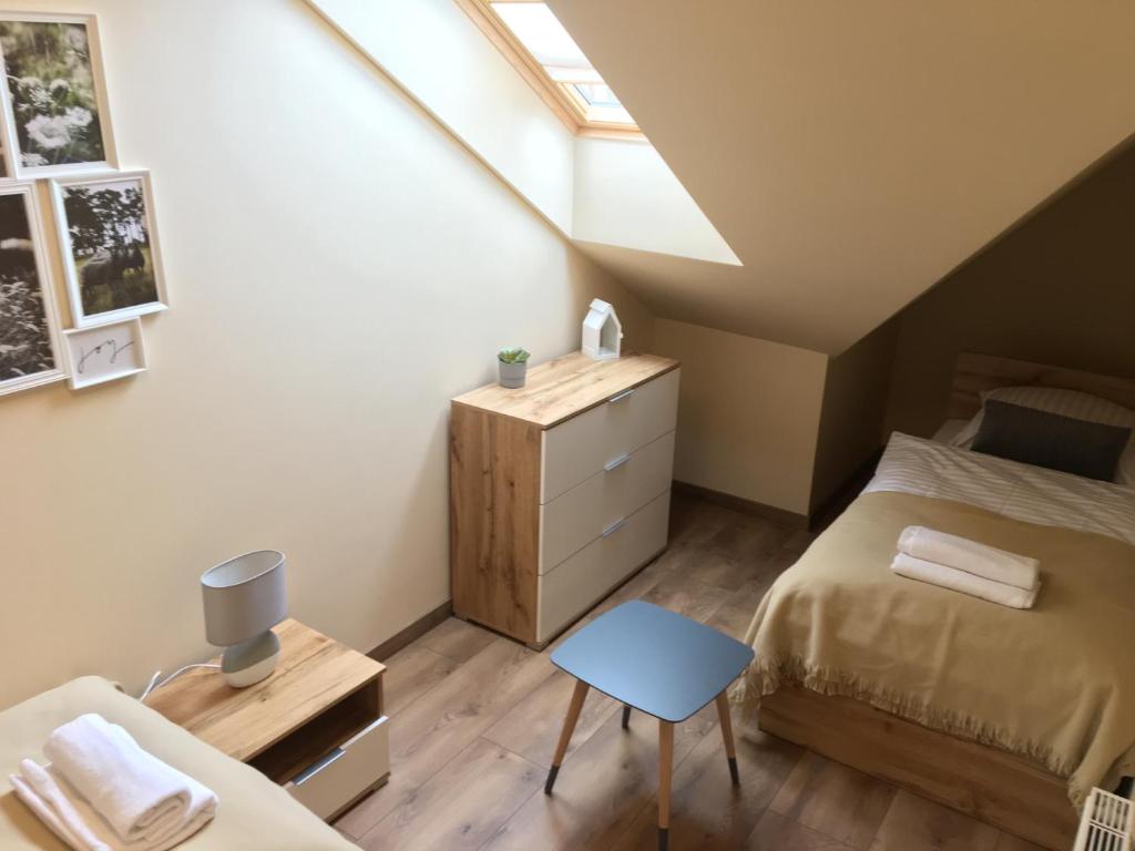 Posteľ alebo postele v izbe v ubytovaní Apartament Silence Triventi Agat