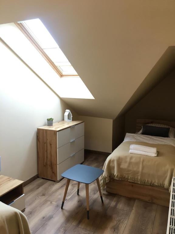 Posteľ alebo postele v izbe v ubytovaní Apartament Silence Triventi Agat