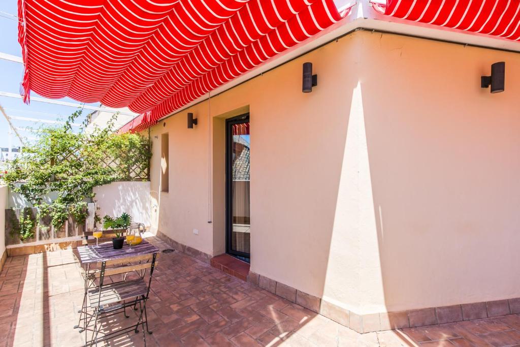 Balkón nebo terasa v ubytování Black Swan Hostel Sevilla