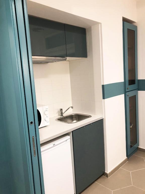 Kuchyň nebo kuchyňský kout v ubytování Hostellino